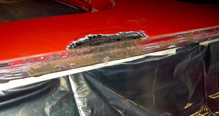 How do you repair surface rust on a vehicle?